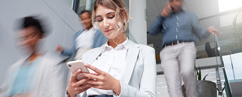 Businessperson looking at their phone