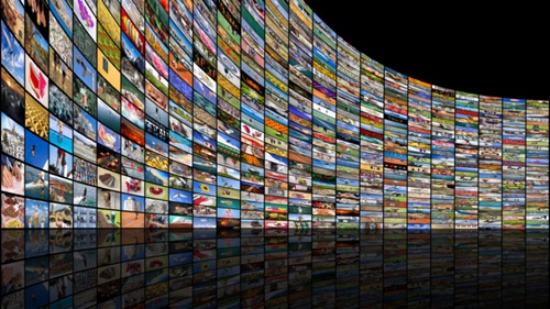 curving wall of screens